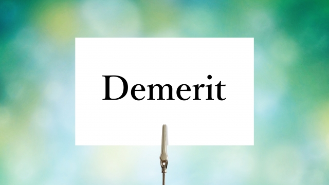 Demeritと書かれたカード